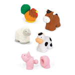 Set of colorful farm animal toys on a white background