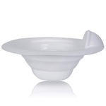 White bowl with a spoon on a white background