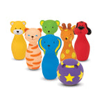 Set of colorful animal-shaped toys on a white background