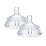 Two clear baby bottle nipples on a white background