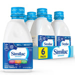 Similac Advance infant formula bottles and packaging on a white background
