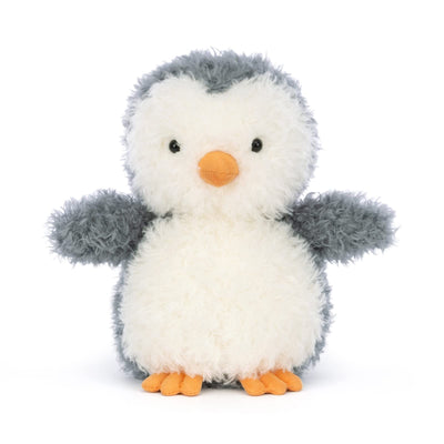 Stuffed penguin toy with a white body, gray wings, and orange feet and beak on a white background