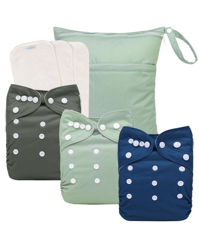 Set of four cloth diapers in different colors with button closures on a white background