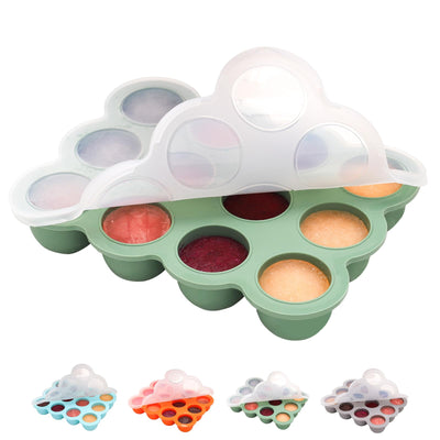 Colorful cloud-shaped ice cube tray with compartments filled with different colored substances on a white background.