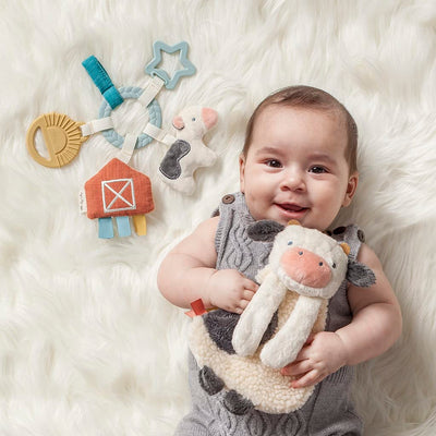 Itzy Ritzy Farm Toy Gift Set - Includes Cow Lovey & Farm-Themed Busy Ring Car Seat and Stroller Toy - Features Crinkle Sounds, Engaging Textures & Silicone Teething Relief (Farm)