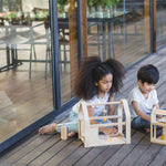 PlanToys Slide and Go Dollhouse - Chemical-Free Wooden Toy Featuring 3 Units with 20 Furniture Pieces