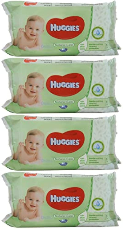 Four packages of Huggies baby wipes on a white background