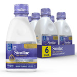 Similac 360 Total Care infant formula bottles and packaging on a white background
