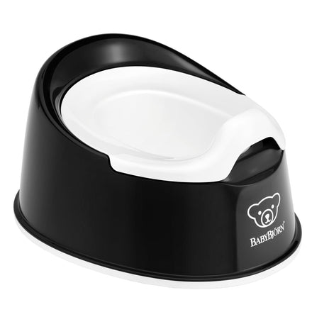 Black and white potty chair with BABYBJöRN logo on a white background