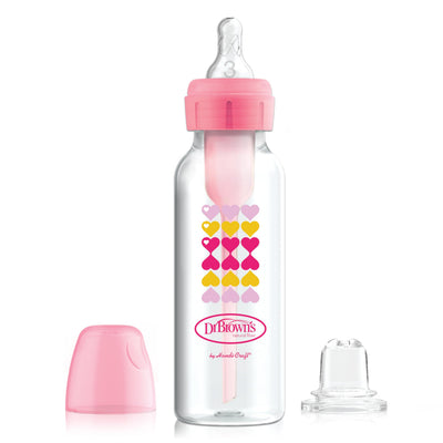 Dr. Brown's baby bottle with pink cap and heart pattern on a white background