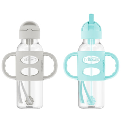 Two baby bottles with handles and different colored lids on a white background