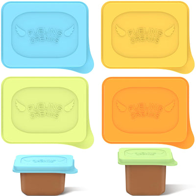 Set of colorful silicone containers with 'Fueling Dreams' branding on a white background