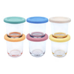 Three glass jars with colorful lids on a white background