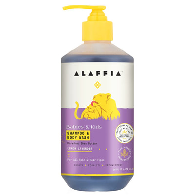 Alaffia shampoo and body wash bottle with yellow pump on a white background