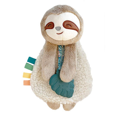 Plush toy sloth with a teething ring on a white background