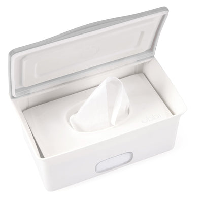 White tissue box with a tissue inside on a white background