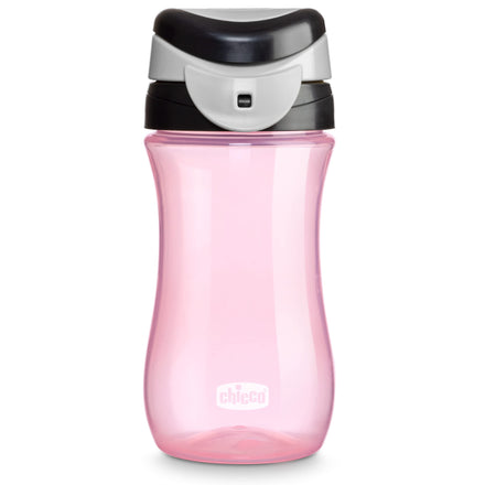 Pink sippy cup with black and gray lid on a white background