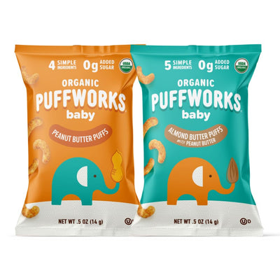 Two packages of Organic Puffworks baby puffs, one orange and one teal, on a white background.