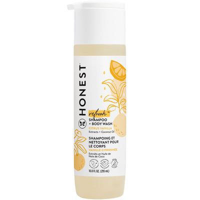 Honest brand shampoo and body wash bottle with citrus and vanilla design on a white background