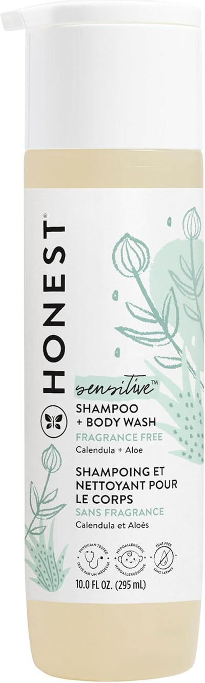 Honest sensitive shampoo and body wash bottle with green and white design.