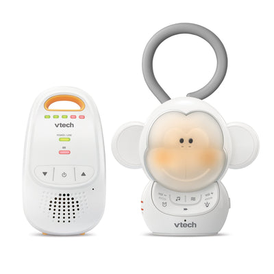 Vtech baby monitor and monkey-shaped rattle on a white background