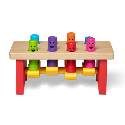 Colorful wooden toy with smiling faces on a white background