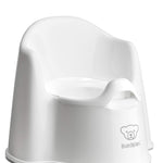 White baby potty chair with BABYBJöRN logo on a white background