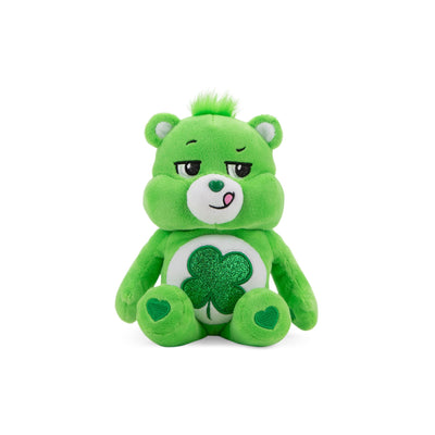 Green plush toy with a shamrock on a white background