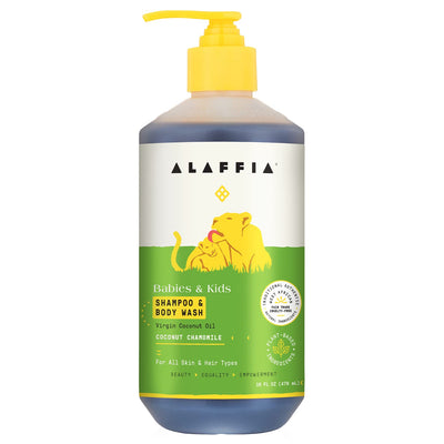 Alaffia shampoo and body wash bottle with yellow pump on a white background