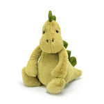 Plush dinosaur toy on a white background