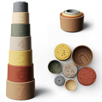 Stackable cups with numbers and shapes on a white background