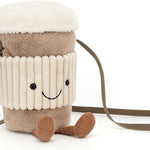 Plush drink container with a smiley face on a white background