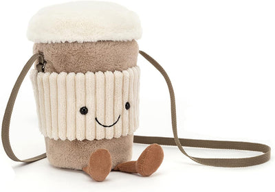 Plush drink container with a smiley face on a white background