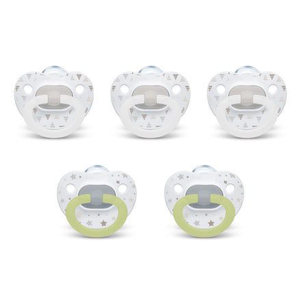 Set of five baby pacifiers with different designs on a white background