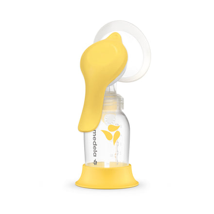 Yellow manual breast pump with Diapere logo on a white background