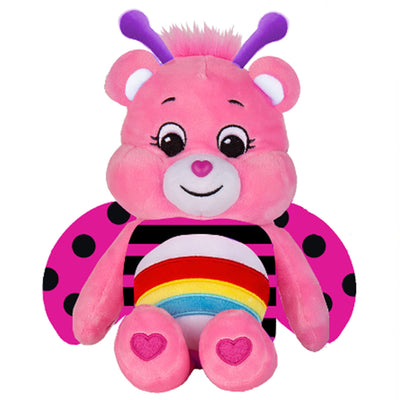 Pink plush toy with purple antennae and rainbow body on a white background