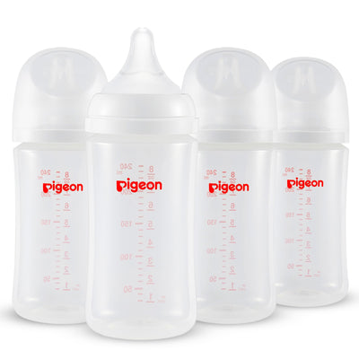Four Pigeon baby bottles with measurement markings on a white background