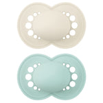 Two baby pacifiers, one beige and one light blue, on a white background.
