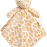 Giraffe-shaped plush toy with a blanket on a white background