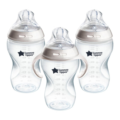 Three Tommee Tippee baby bottles on a white background