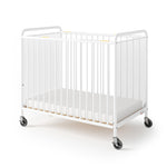 Foundations Chelsea Clearview Metal Compact Daycare Crib, 3" Casters, Compact Mini Size, Easy to Clean Durable Finish, Adjustable to Two Heights Mattress Board (White)
