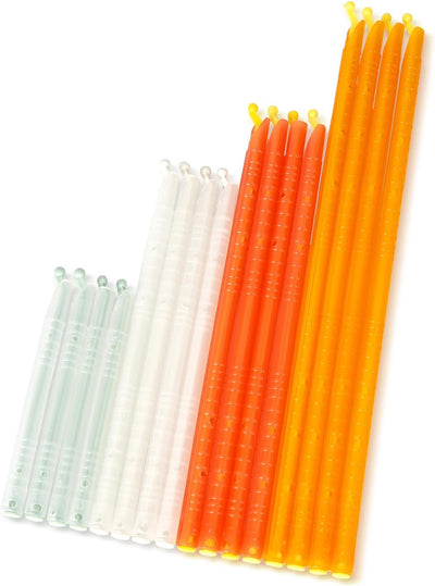 Set of colorful straws including orange, yellow, and clear on a white background