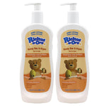 Two bottles of Ricitos de Oro Honey Bee & Argan body lotion on a white background