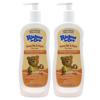 Two bottles of Ricitos de Oro Honey Bee & Argan body lotion on a white background