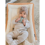 Itzy Ritzy - Ritzy Teether for Molars - Massages Sore Gums & Reaches Back Molars - Silicone Baby Teething Toy with Multiple Textures & Flexible Design - Teething Relief for 3 Months & Up (Elephant)