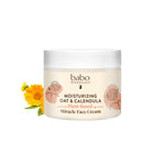 Babo Botanicals moisturizing cream jar with flowers on a white background