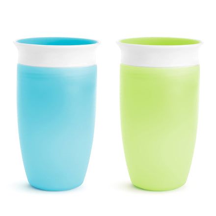 Two colorful cups, one blue and one green, on a white background
