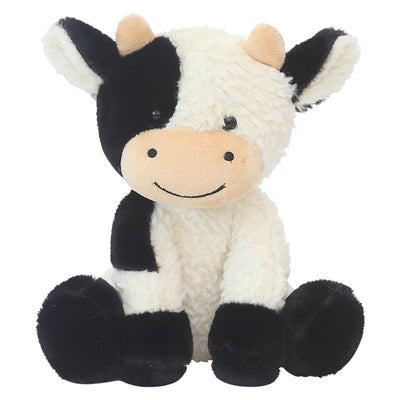 Plush cow toy with black and white pattern on a white background