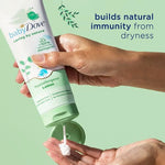 Baby Dove Hypoallergenic Lotion Caring By Nature 2 Count Build a Healthy Foundation for Your Baby's Skin Contains Vitamin E and 100% Natural Moringa Oil 13.5 fl oz (Pack of 2)