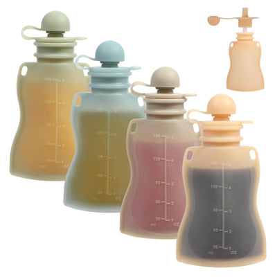 Set of silicone breast pumps in various colors on a white background